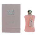 Pink perfume bottle with silver cap and tassels next to a matching box on a white background