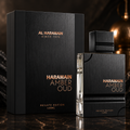 Haramain Amber Oud perfume bottle and packaging on a dark background