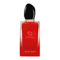 Red Giorgio Armani perfume bottle with black cap on a white background