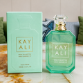 Kay Ali perfume bottle and packaging on a marble surface with a neutral background